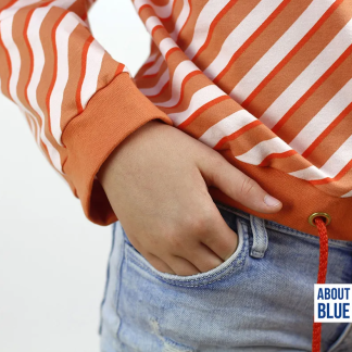 boordstof oranje about blue fabric